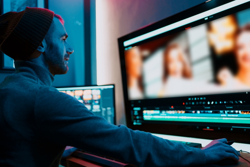 man using film production software